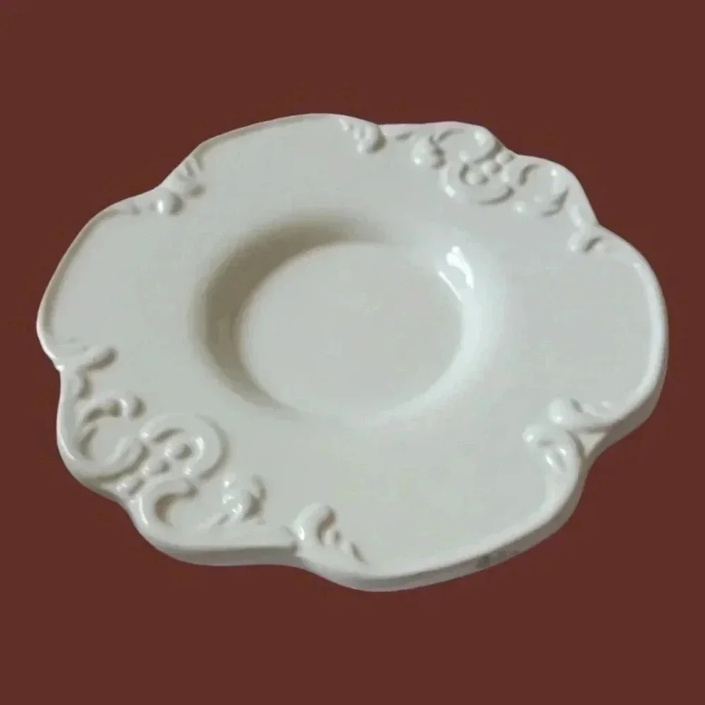 Shabby chic porcelain teacup and saucer